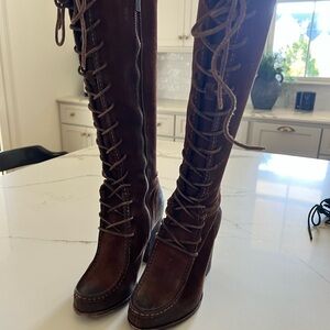 Frye women’s brown suede boots .